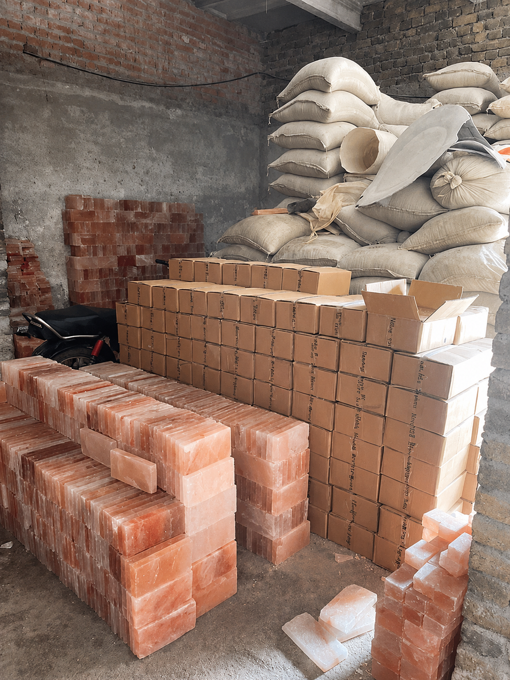 Pink salt products arranged with protective export cartons